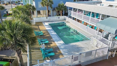 Pool featuring fence