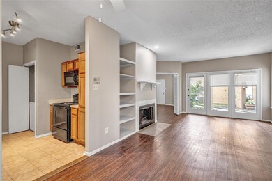 Unfurnished living room with a textured ceiling an