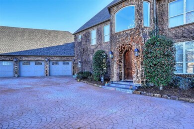 All Custom the Stone and Brick with Ample Parking for Family / Three Car Garage