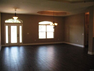 A view from living to foyer & dining is seen here.
