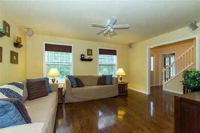Living room looking out to foyer and...