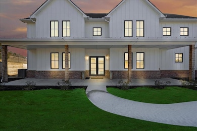 View of front of property with a lawn