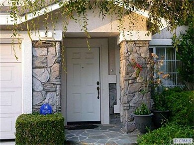 Covered Entry with Stone Facade