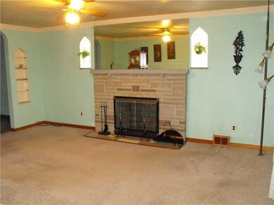 Living Room. Spacious Living Room with Brick Firep