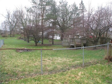 Fenced in backyard at back of home