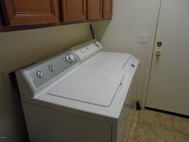 INSIDE LAUNDRY W/ WASHER & DRYER