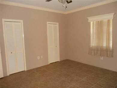 MASTER BEDROOM  has two walk in closets and a ceil
