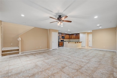 Unfurnished living room with recessed lighting, st