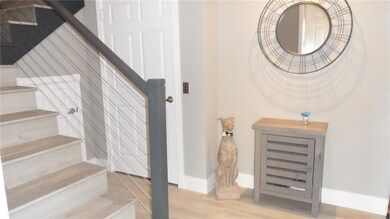 FOYER WITH LIFT/STAIRS