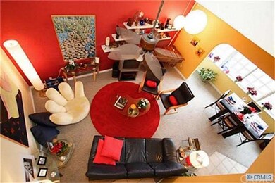 View from Loft down to Living/Dining area