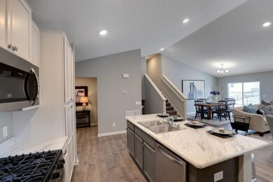 Another view of the large kitchen including stainl