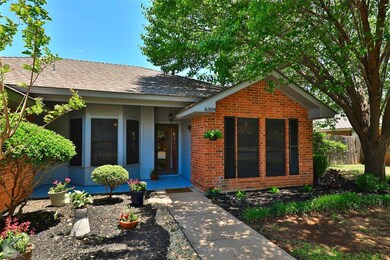 Landscaping and shade makes a beautiful front yard