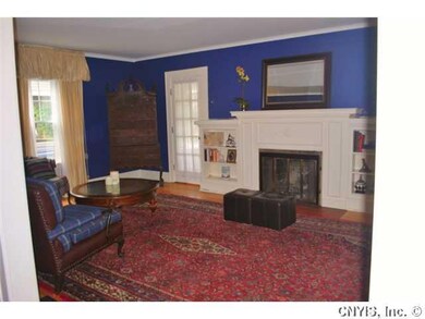Living Room. And a wood burning fireplace.