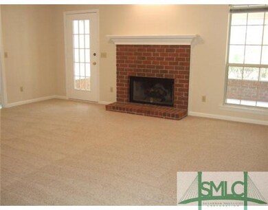 Den/Family/Great Room. Door opens to screened porc