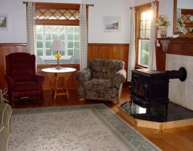 Living room with cypress wainscoting...