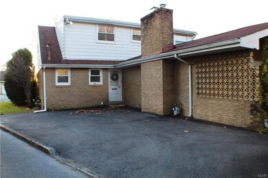 Parking area, shows the multi-flue chimney, natura