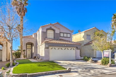 Mediterranean / spanish house with a tile roof, an