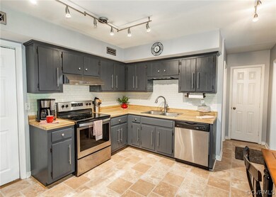 Spacious Kitchen, painted cabinets and SS applianc