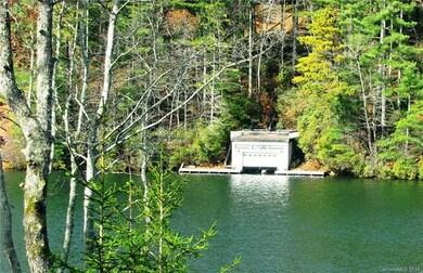 View of boathouse and docks from across the lake