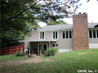 Exterior Back. Sliders from family room lead to co