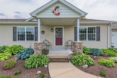 Welcome Home!!  Front porch and landscaped area.