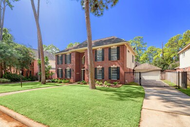 Surrounding mature trees and well-maintained landscaping create a picturesque setting for this charming brick home. A paved sidewalk leads guests to the front door and a paved, gated driveway allows you controlled access to your detached two-car garage.