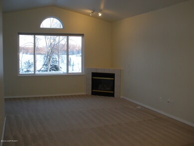 Living Room W Vaulted Ceilings & FP