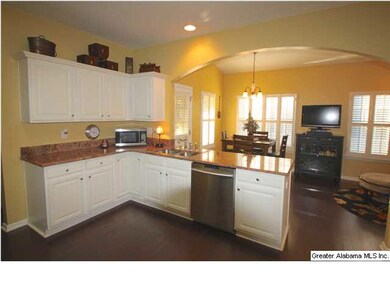 Cheerful kitchen and the crisp white cabinets crea