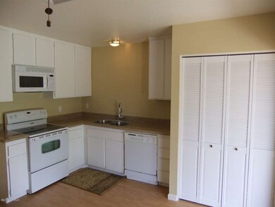 kitchen with slab granite countertops
