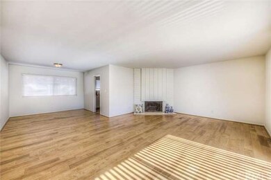 Spacious Living Room With Fireplace