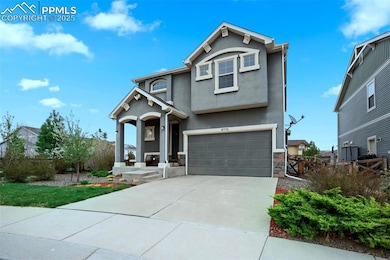 View of front of house featuring stucco siding, dr