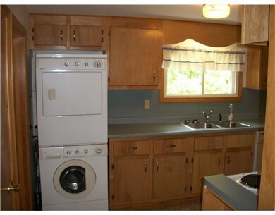 Kitchen. Door to left is to basement.