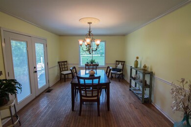 Beautiful formal dining overlooking the koi pond!