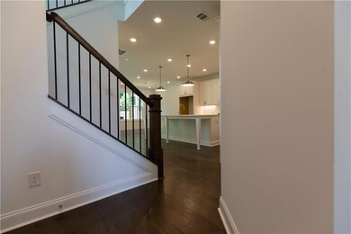 As you turn the corner from the foyer, you find an amazing open floor plan and are instantly drawn in by the beautifully designed kitchen. Not actual home. Photos of previously Stockton floorplan.