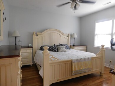 Private, large master bedroom and bath will hold large furniture.