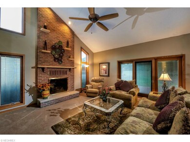 Family room with gas fireplace, adjacent to the dinette