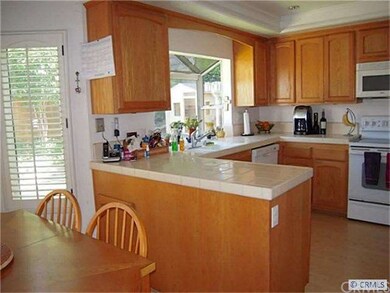 A view of the kitchen from the breakfast nook.