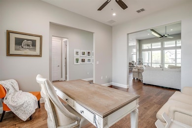 Dining room featuring recessed lighting, dark wood