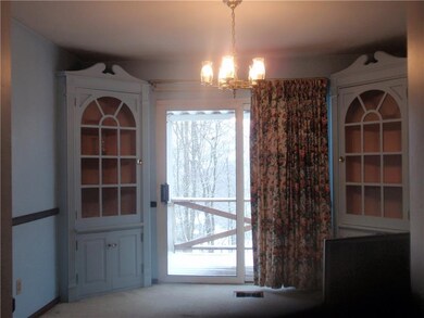 Dining room with Built in corner cupboards, slider