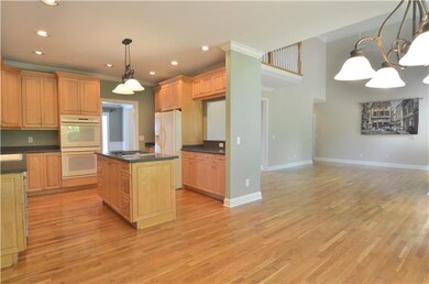 The spacious kitchen has nice raised-panel cabinet