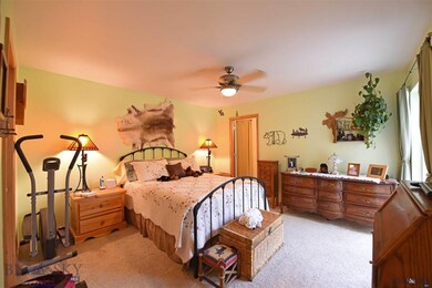 Master Bedroom with Patio Access and Walk-in close