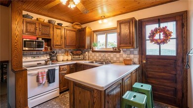 Charming wood ceiling adds character.