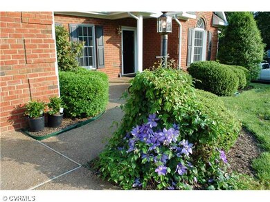 Exterior Front - No barrier entry with aggregate driveway and walkway.  Two motion detection lights.