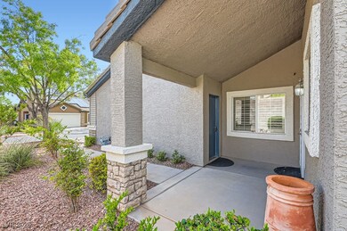 Property entrance featuring a patio area and stucc