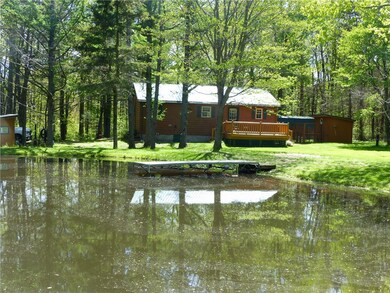 Beautiful pond with patio area to sit and enjoy th