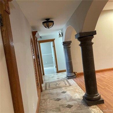 Corridor featuring light hardwood / wood-style flooring