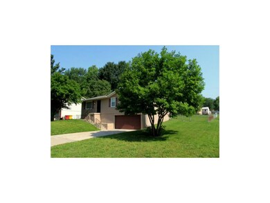 NICE CORNER FENCED LOT!  TWO CAR GARAGE!