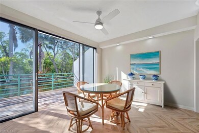 Dining space featuring ceiling fan and light parqu