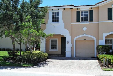Front facade with 2-car driveway.