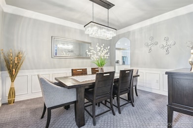 Formal dining room is inviting